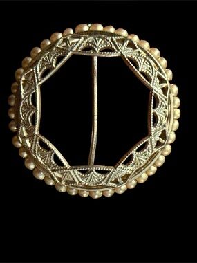 Sterling Silver filigree brooch/pin decorated with a border of delicate seed